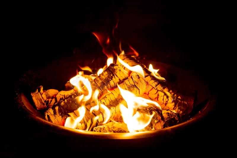 fire-pit-night-showing-glowing-embers-fire-pit-night-showing-glowing-embers-106393443